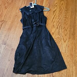 Black A-line cocktail dress with ruffled detail cap sleeves and sailor collar